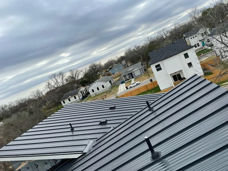 Standing seam metal roof panels with vents for Skylight Repair in Merrimack